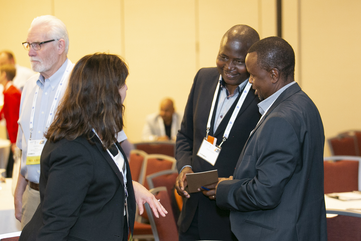 Conference participants from Network Rail chatting with Susan Lubell