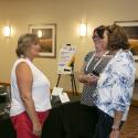 PEMAC's Nova Scotia Chapter President Martha Myers mingling with friends 