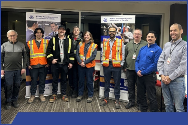 PEMAC Calgary visits WITRON Facility. Attendees an organizers stand together for a group photo.